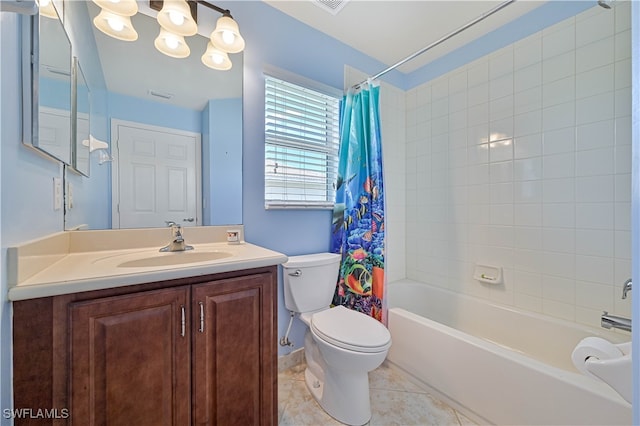 full bathroom featuring tile patterned flooring, vanity, toilet, and shower / bath combo