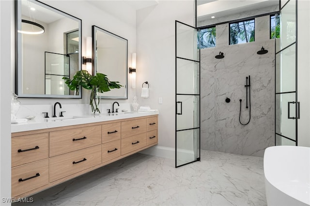 bathroom featuring vanity and a shower with door