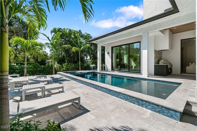 view of pool with a patio area