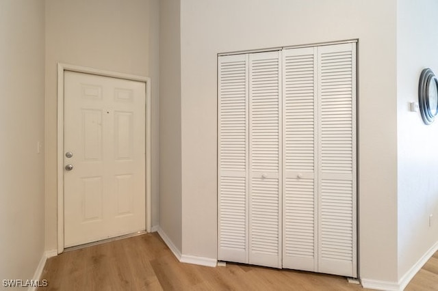 hallway featuring light hardwood / wood-style floors