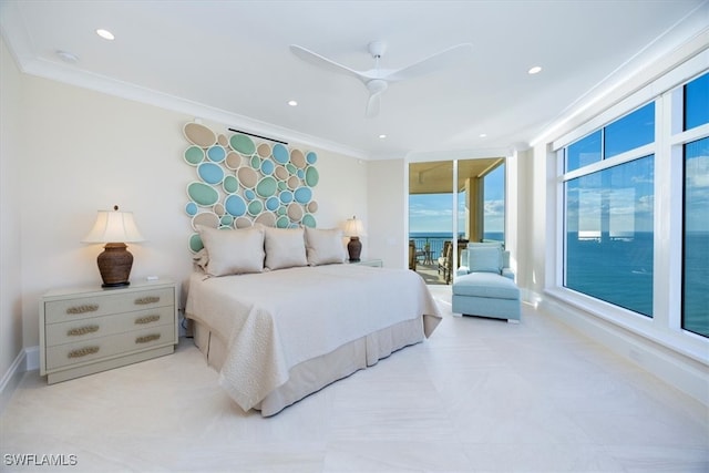 bedroom with ceiling fan, a water view, and ornamental molding