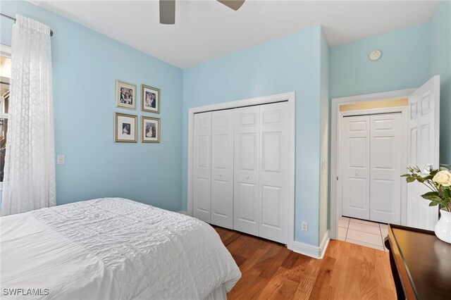 bedroom featuring hardwood / wood-style flooring and ceiling fan