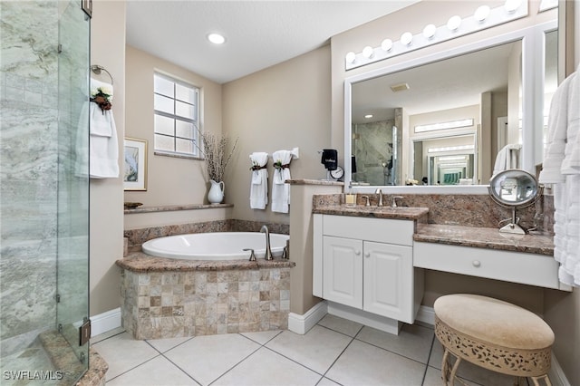 bathroom with separate shower and tub, tile patterned flooring, and vanity