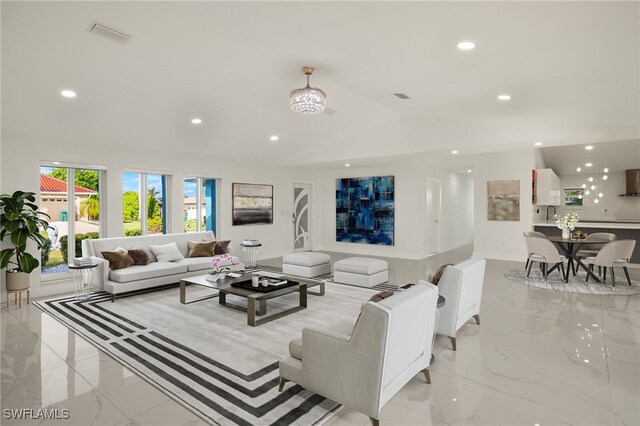 living room with lofted ceiling