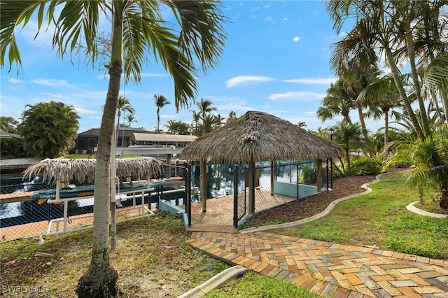 view of dock featuring a yard