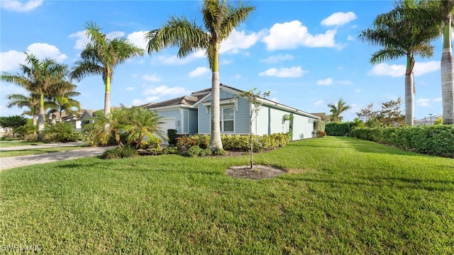 view of property exterior featuring a yard