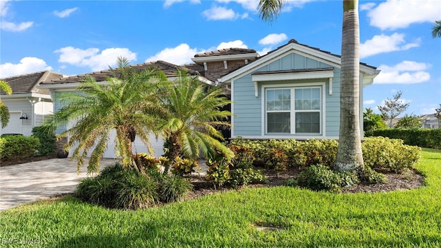 view of property exterior with a garage