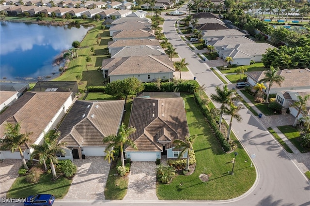 drone / aerial view featuring a water view