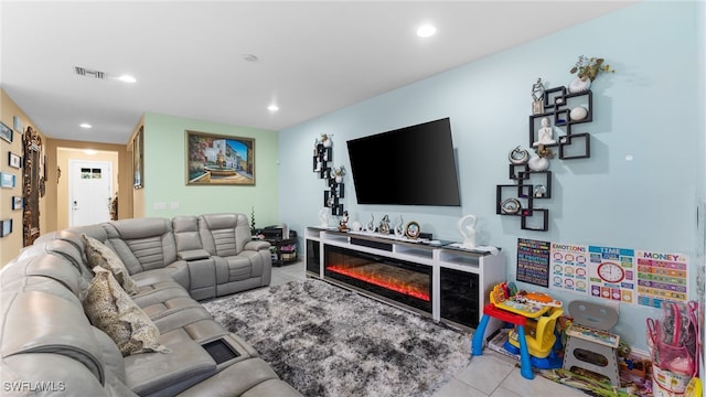 living room featuring light tile patterned floors