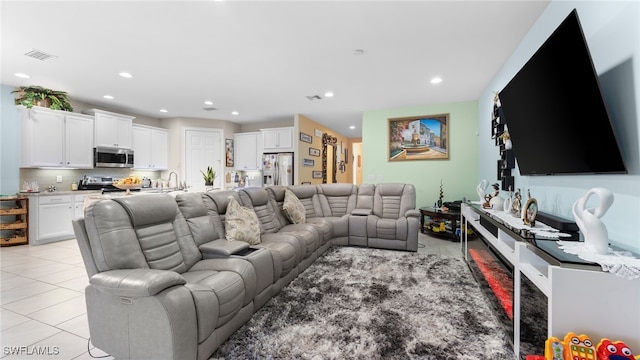 living room with light tile patterned floors