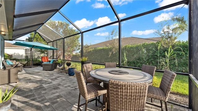 view of patio with a lanai