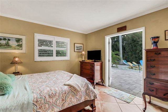 bedroom featuring access to exterior, crown molding, light tile patterned flooring, and multiple windows