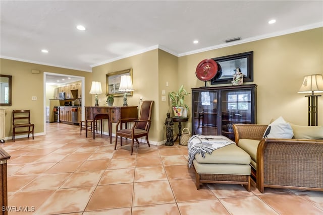 living area with ornamental molding and light tile patterned floors