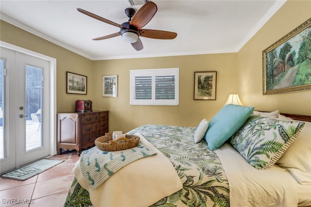 tiled bedroom featuring access to outside, ceiling fan, and french doors