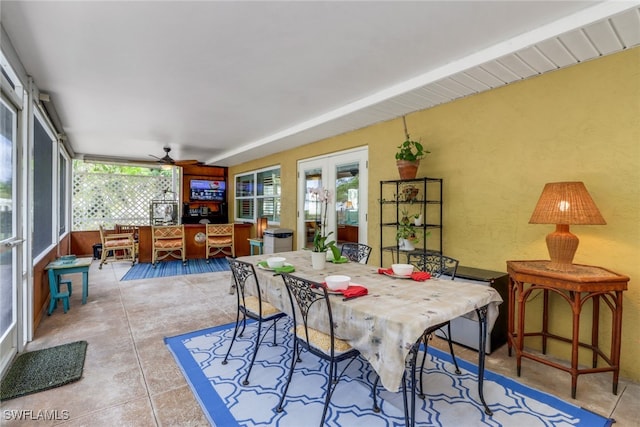 dining space featuring ceiling fan