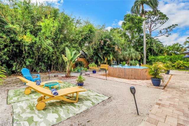 view of home's community featuring a patio