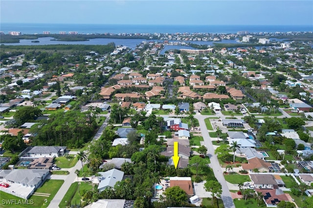 bird's eye view with a water view