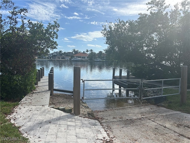 dock area featuring a water view