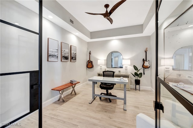 office area featuring light wood-type flooring and ceiling fan