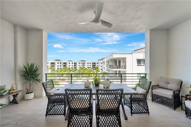 balcony featuring ceiling fan