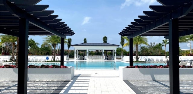 view of swimming pool with a pergola, a patio, and a gazebo