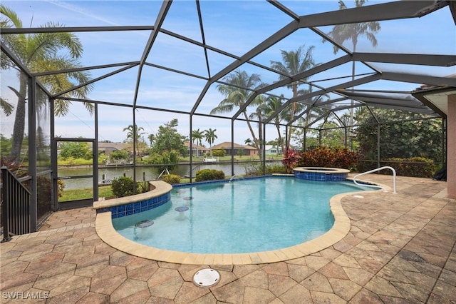 view of swimming pool featuring glass enclosure, an in ground hot tub, a patio area, and a water view