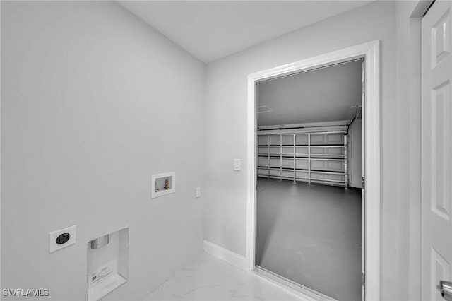 laundry area with hookup for an electric dryer and washer hookup