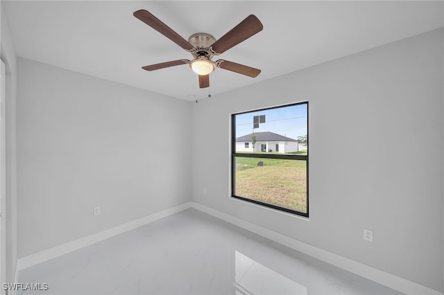 empty room featuring ceiling fan