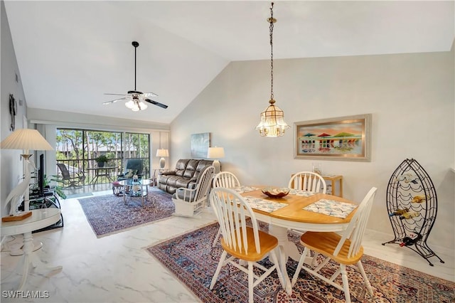3032 Sandpiper Bay Cir Unit G305, Naples, FL 34112 - dining area featuring ceiling fan, a chandelier, and high vaulted ceiling