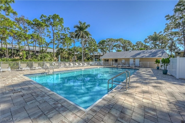 3032 Sandpiper Bay Cir Unit G305, Naples, FL 34112 - community pool with fence and a patio