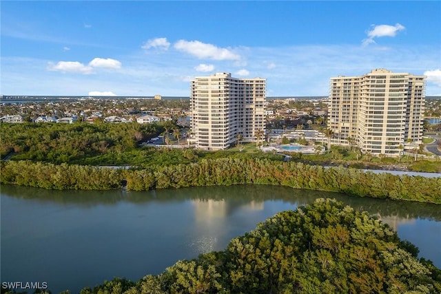 birds eye view of property with a water view