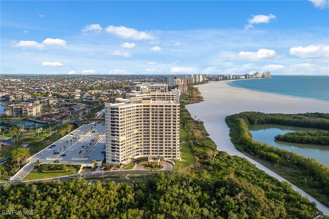 bird's eye view featuring a view of the beach and a water view