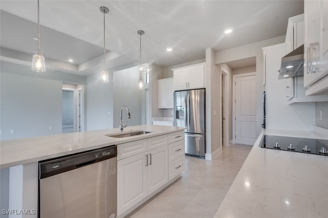 kitchen featuring white cabinetry, sink, decorative light fixtures, and appliances with stainless steel finishes