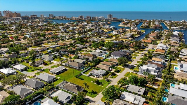 drone / aerial view featuring a water view