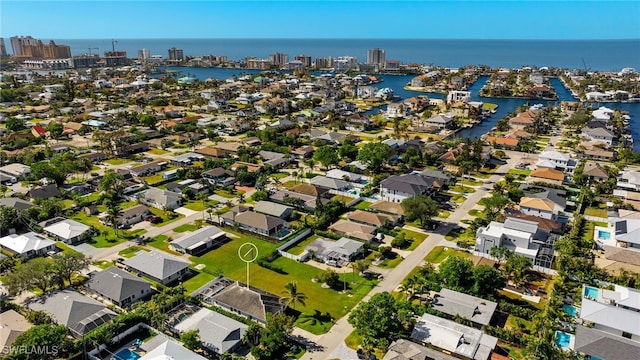 drone / aerial view with a water view