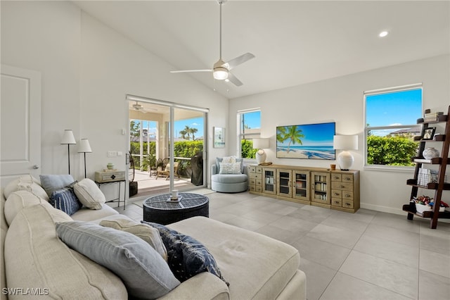 living room with ceiling fan, light tile patterned floors, and high vaulted ceiling