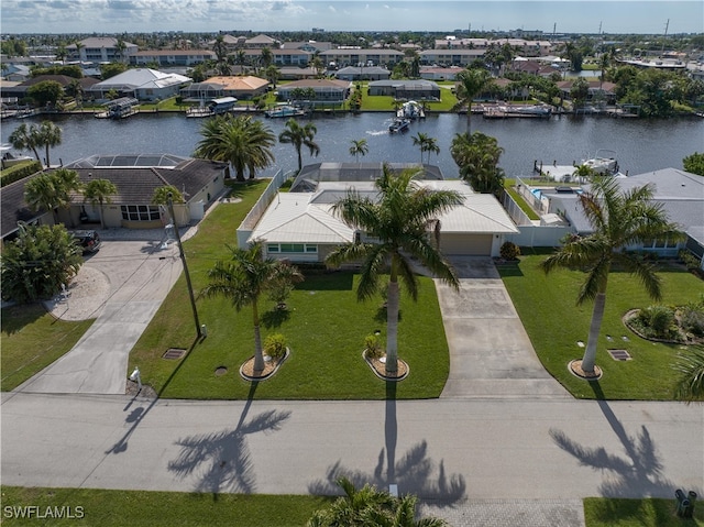 bird's eye view with a water view