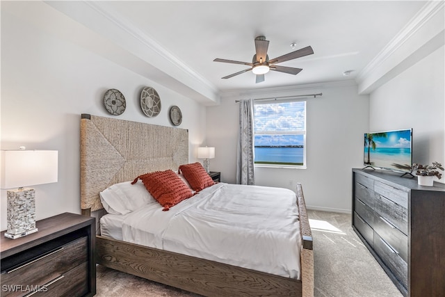 bedroom featuring ceiling fan, crown molding, and light carpet