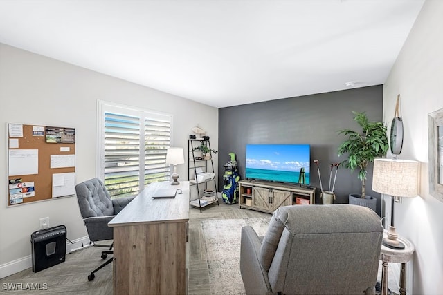 home office with light wood-type flooring