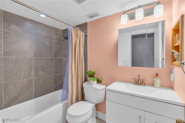 full bathroom featuring vanity, shower / tub combo, and toilet