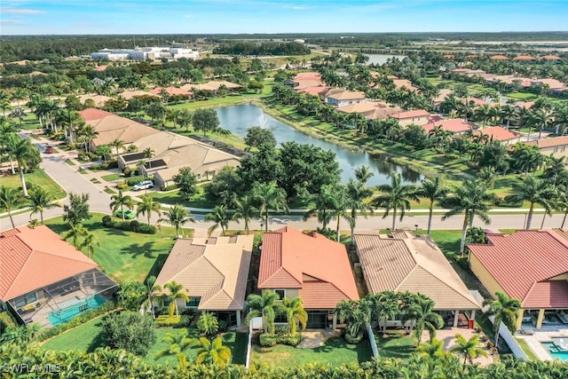 aerial view featuring a water view and a residential view