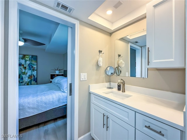 bathroom with vanity and ceiling fan