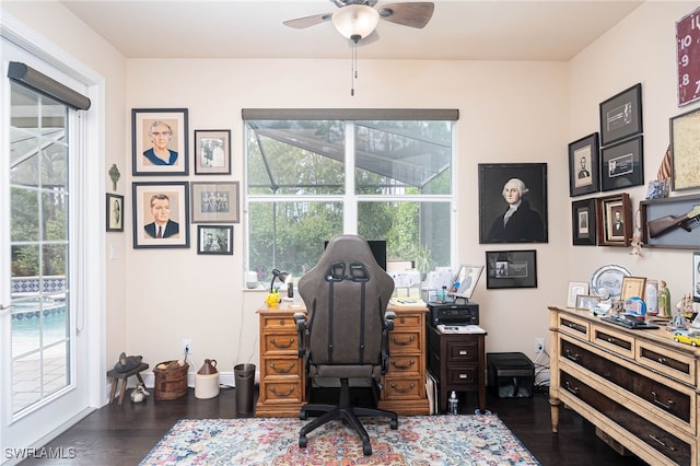 office with ceiling fan and dark hardwood / wood-style floors