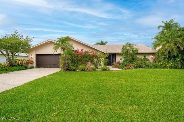 ranch-style home featuring a front lawn and a garage