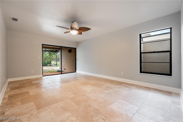 empty room featuring ceiling fan