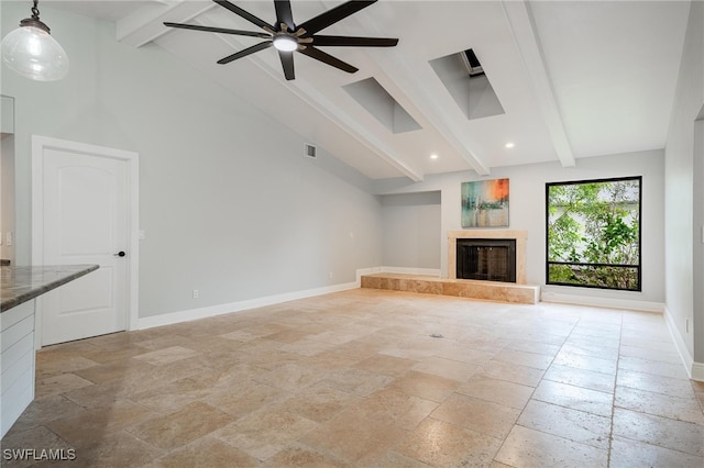 unfurnished living room with high vaulted ceiling, ceiling fan, and beam ceiling