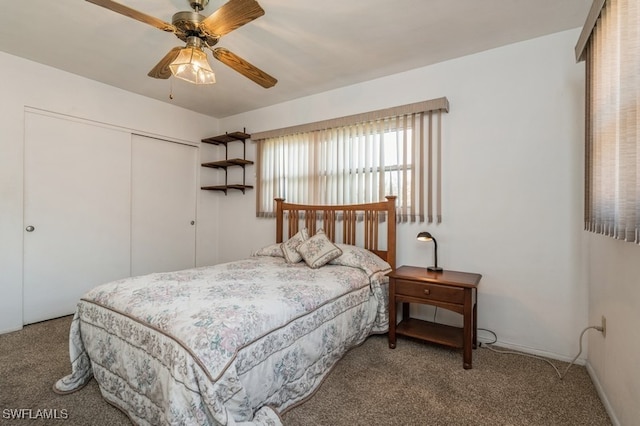 bedroom with a closet, ceiling fan, and carpet