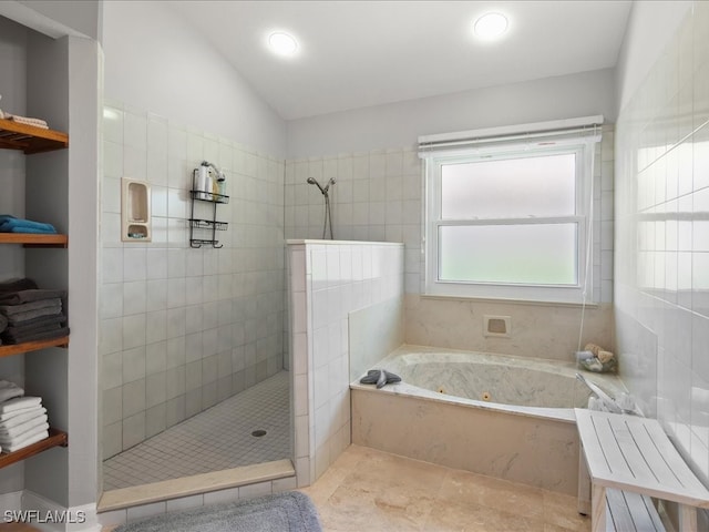 bathroom featuring lofted ceiling and separate shower and tub