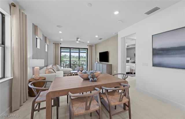 dining room featuring ceiling fan