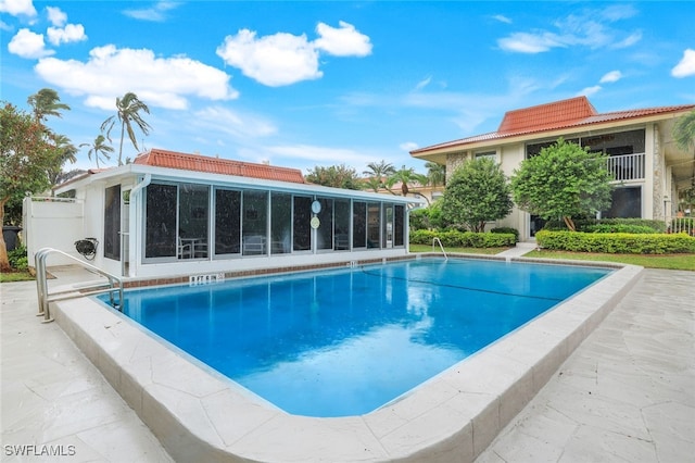 1200 Cherrystone Ct Unit B209, Naples, FL 34102 - community pool with a sunroom